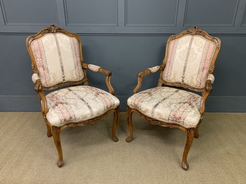 Pair of French Carved Walnut Armchairs