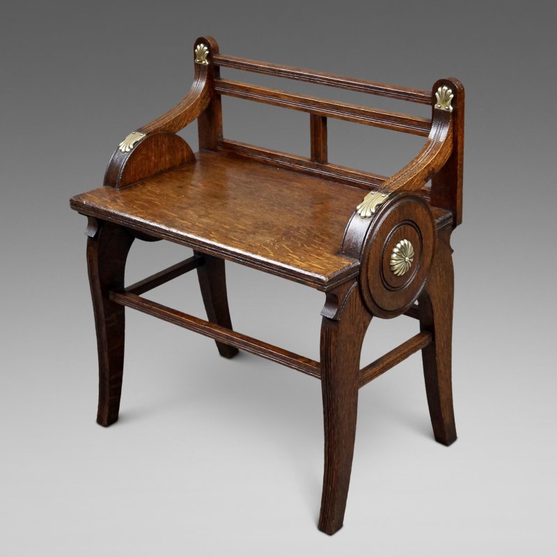 An Oak And Brass Mounted Hall Bench By James Shoolbred & Co.