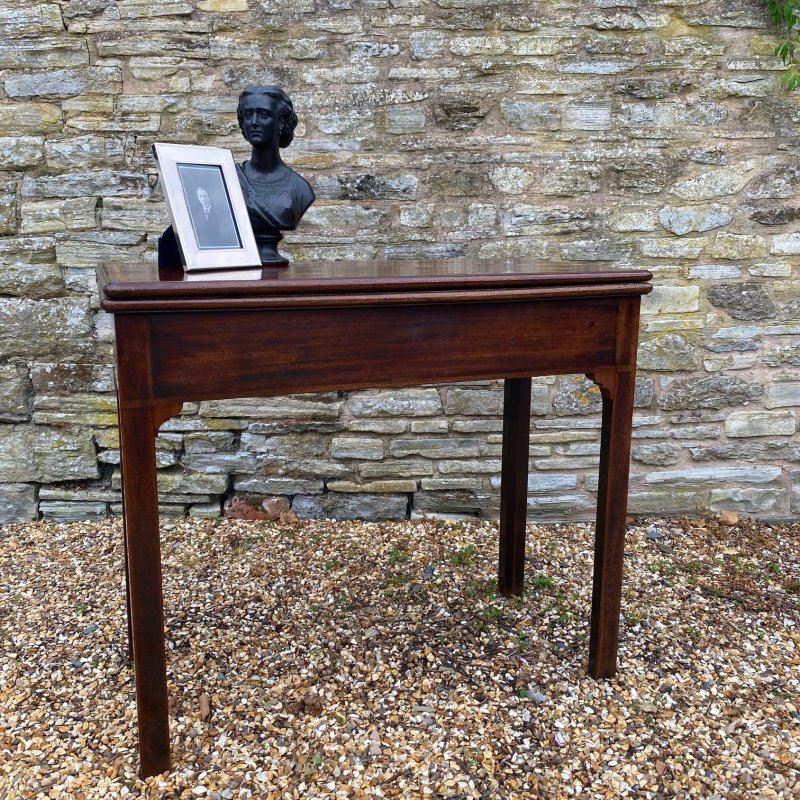 Georgian mahogany fold over games table