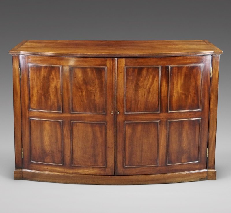 An Unusual George III Bow-Fronted Cupboard