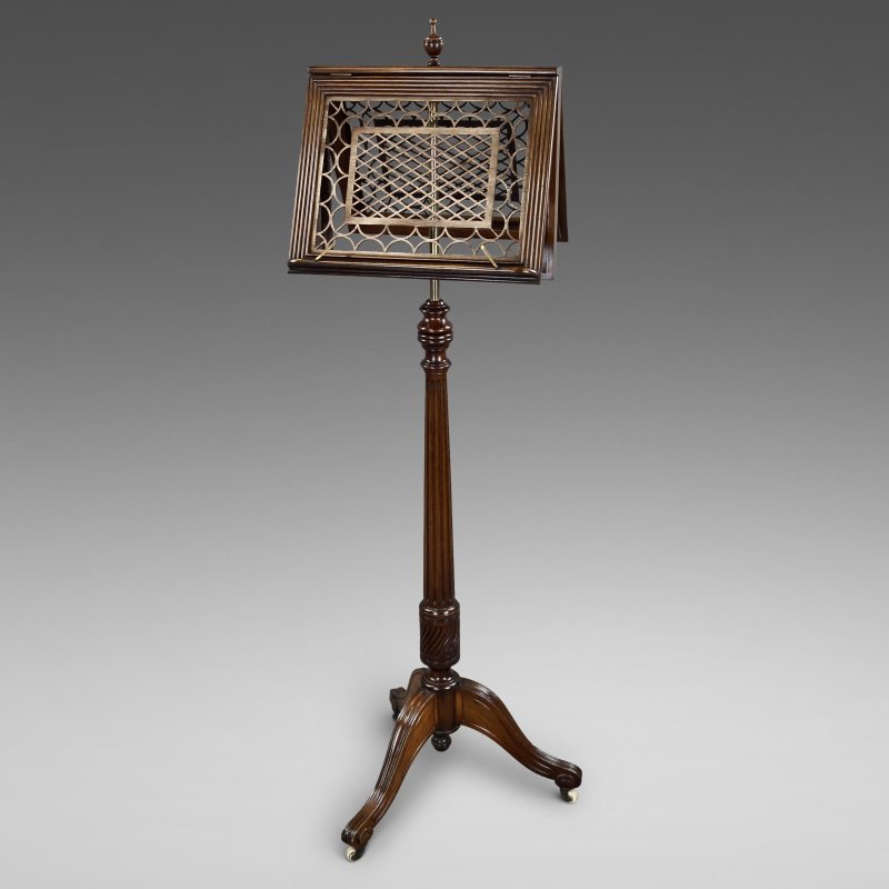 A Superb Mahogany Fretted Duet Stand