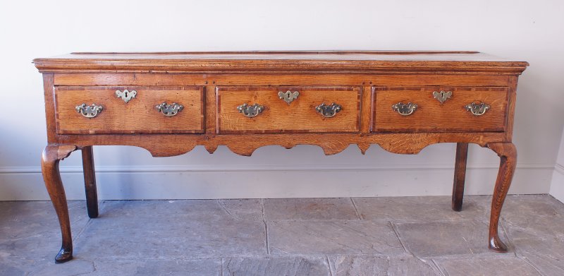 An 18th Century Cabriole Leg Dresser Base