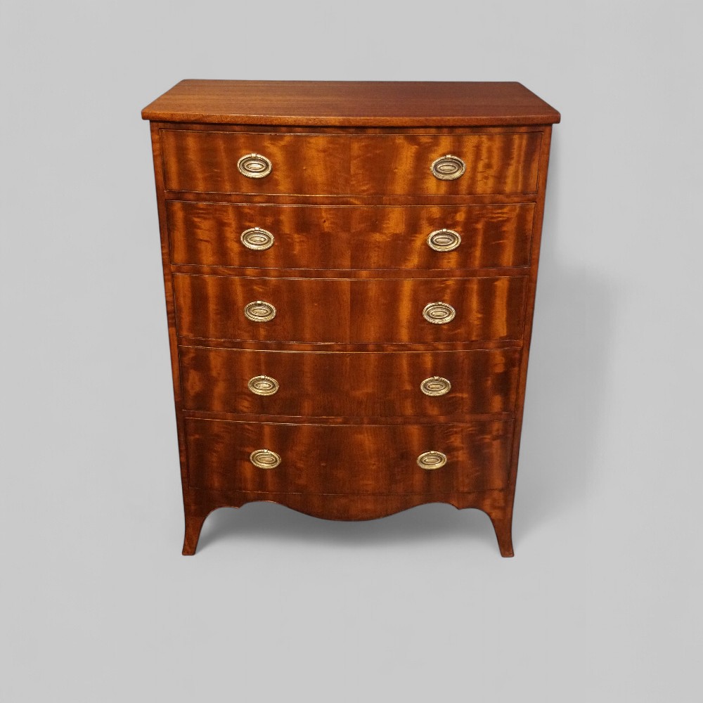 George VI mahogany bow front chest