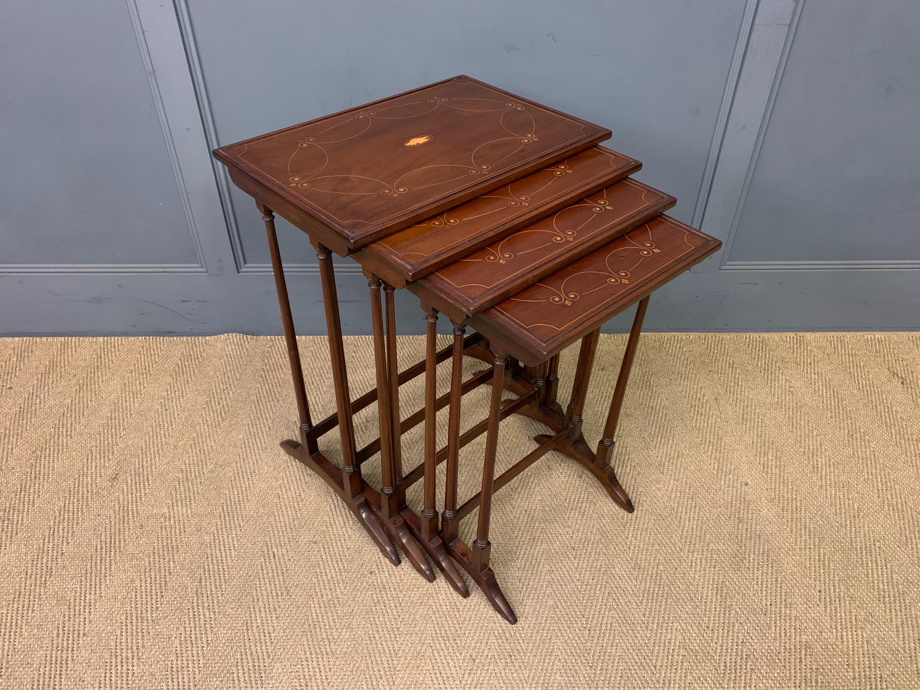 Nest of 4 Inlaid Mahogany Tables