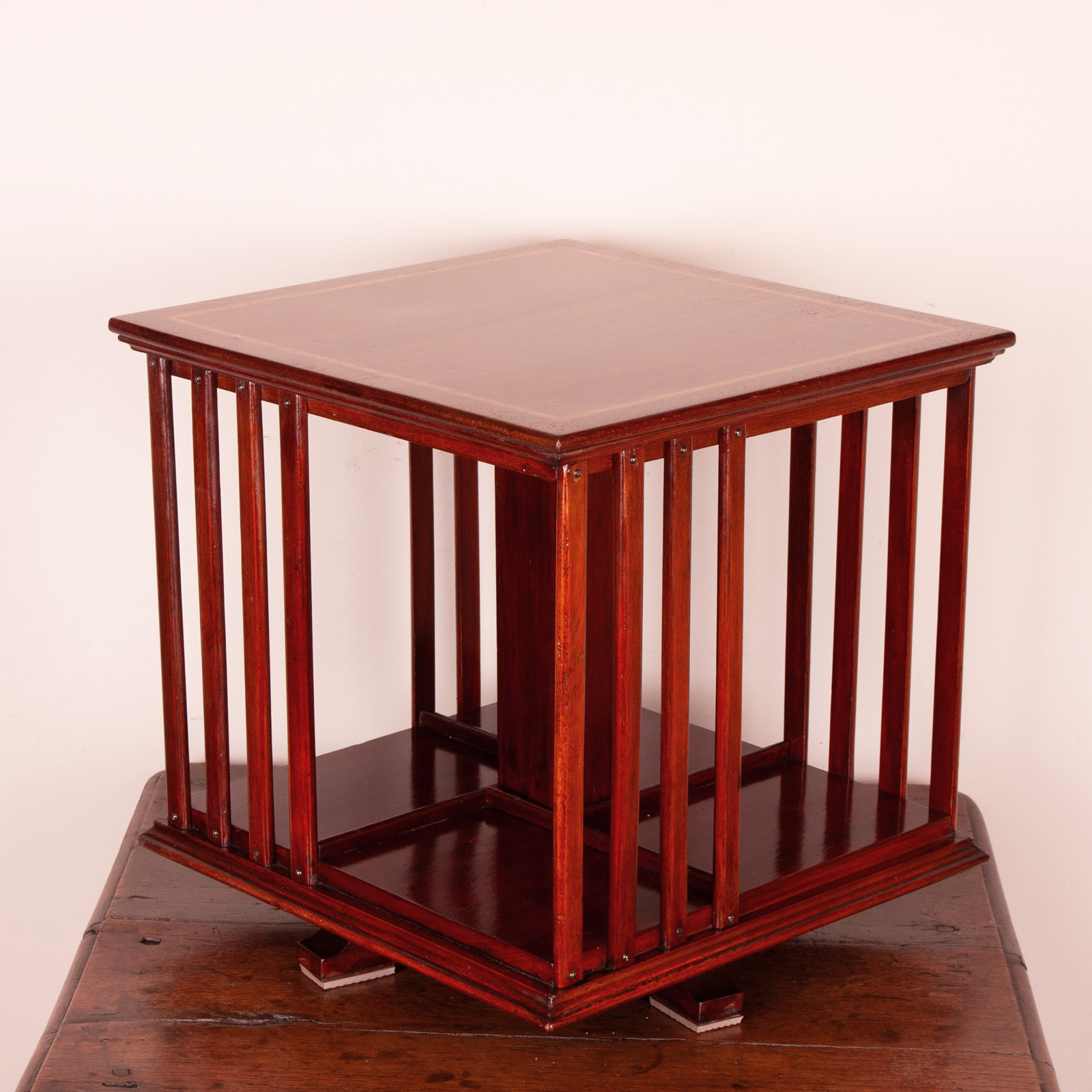Inlaid Table Top Revolving Bookcase
