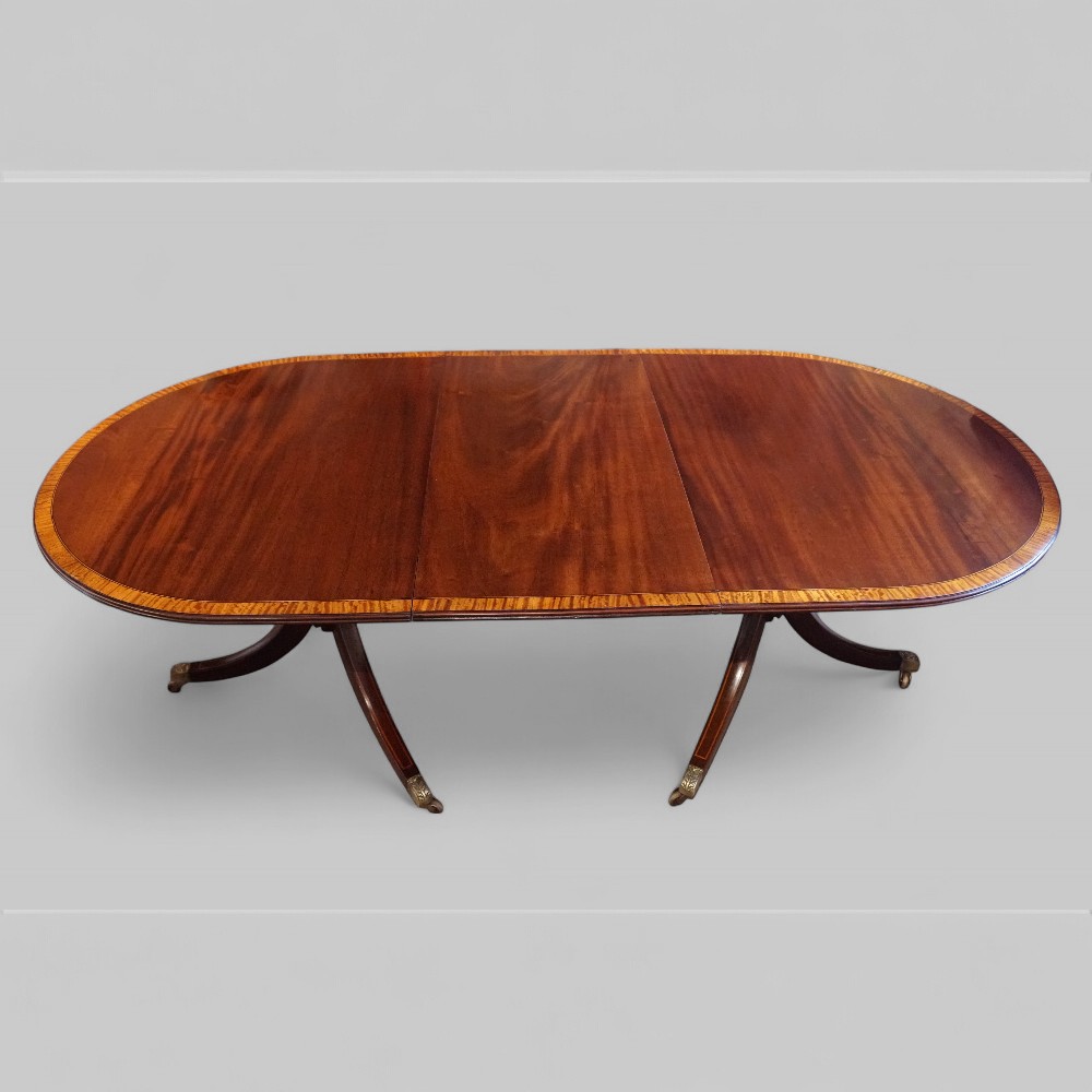 George V mahogany twin pillar dining table